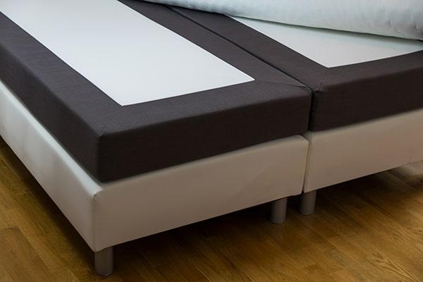 box spring removal typically involves disassembling the box spring and properly disposing of it